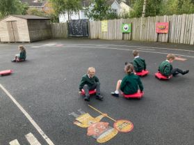 Outdoor Play Based Learning in connection with our ‘Colour’ Topic
